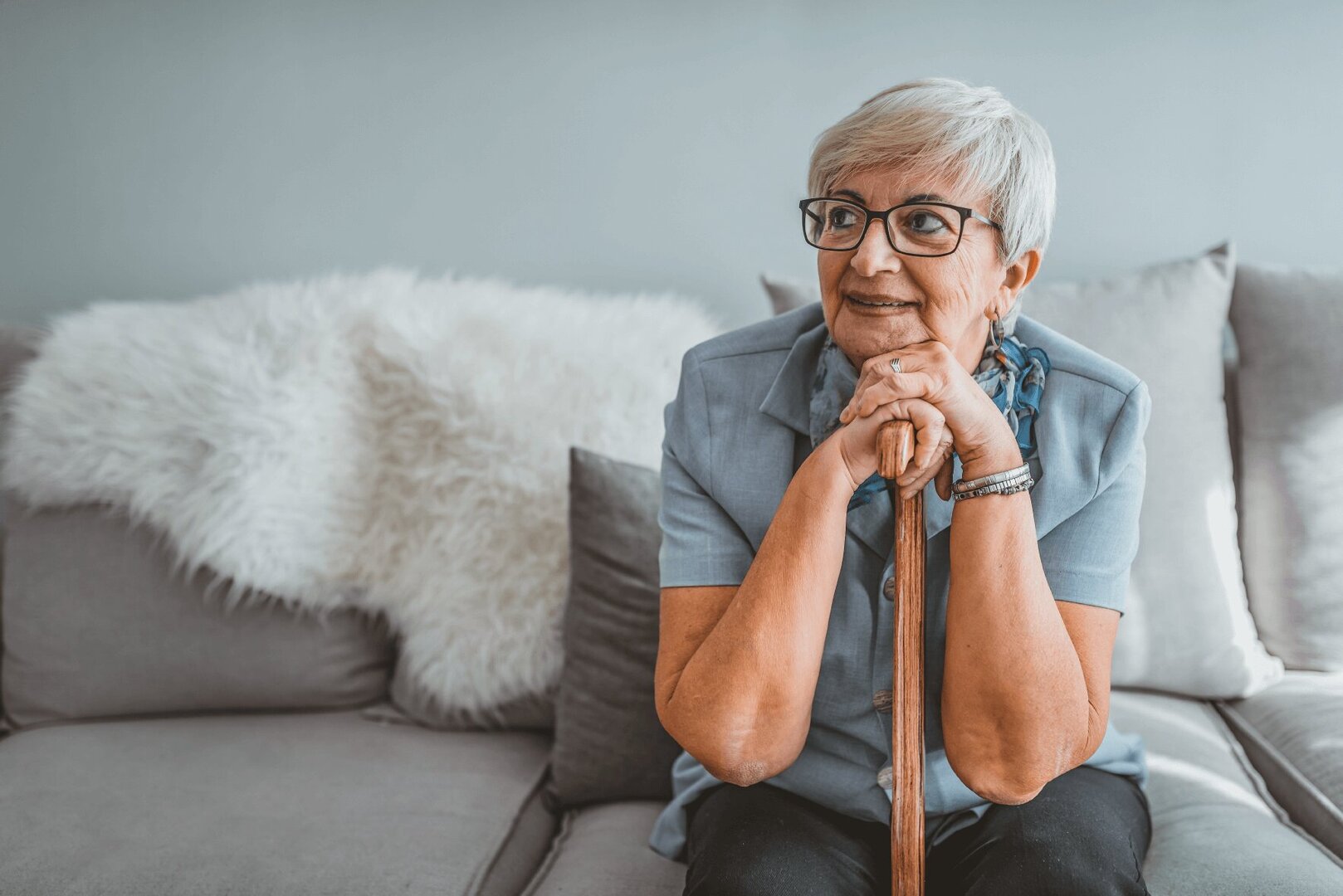senior-woman-leaning-on-cane (1) Senior woman leaning on cane