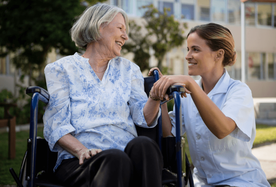 nurse-talking-to-senior-in-wheelchair (1)